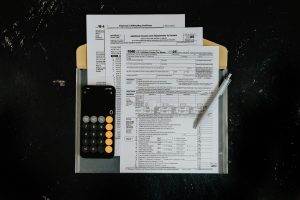 IRS Form 1040 and tax documents for taxpayers who owe taxes and can't pay by April 15